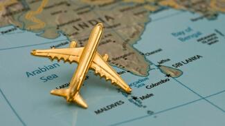 a toy plane on a map
