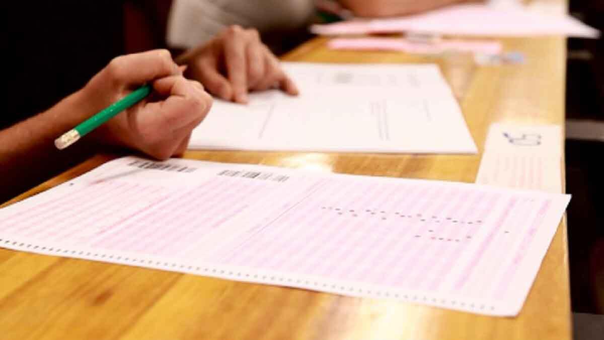 student writing an NBT exam