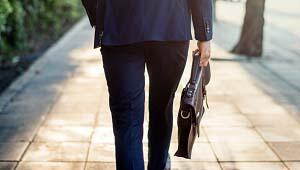 man walking briefcase