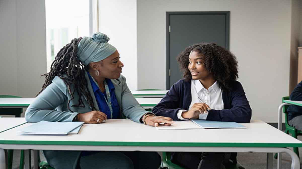 teaching assistant helping learner