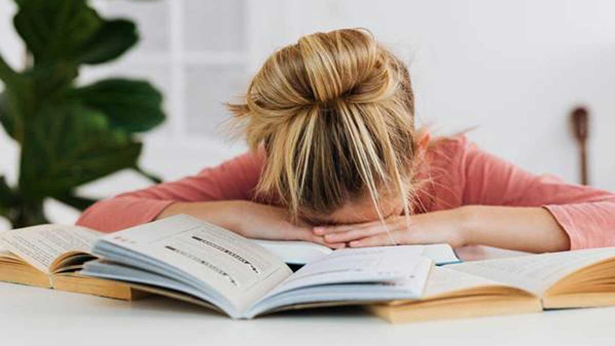 Woman with head down