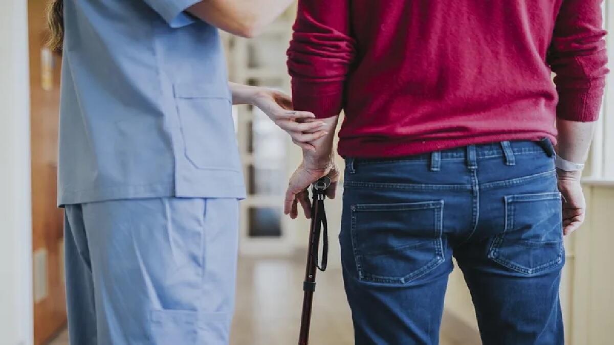  Physiotherapist assist a patient at a hospital