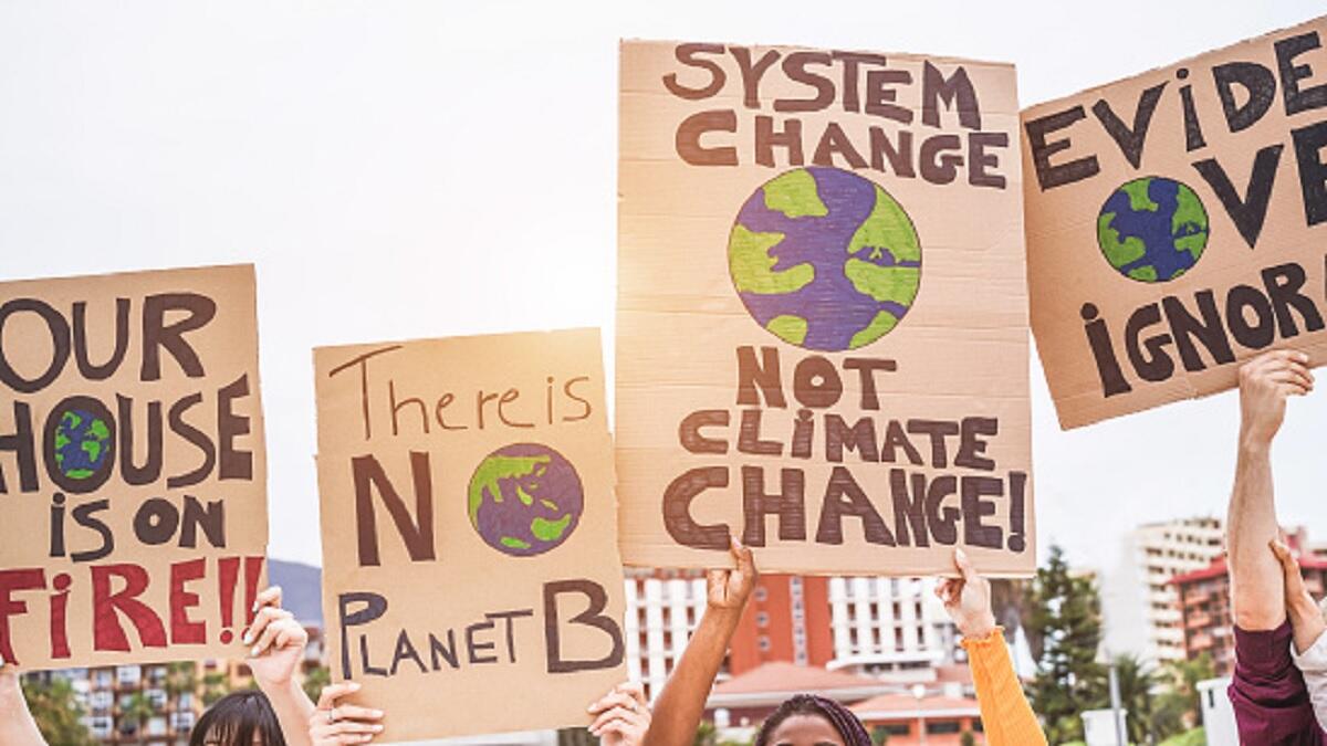 youth protesting to raise awareness about climate change