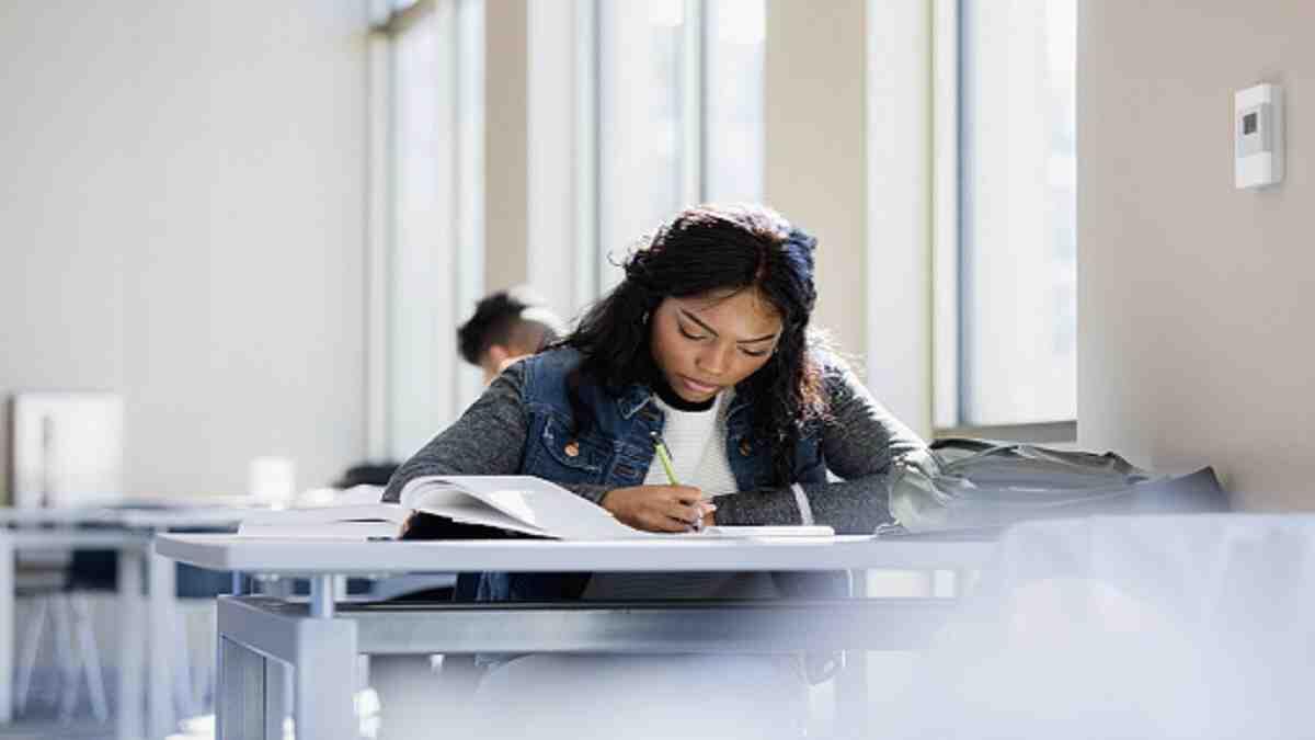 A matric learner studying to rewrite their exams.