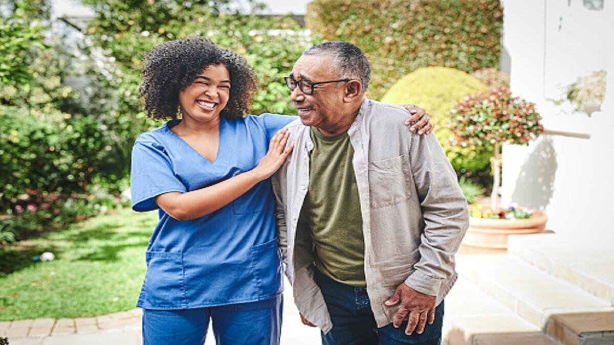 A nurse working with a patient. 