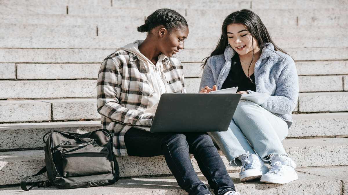 Students filling in their 2024 university applications