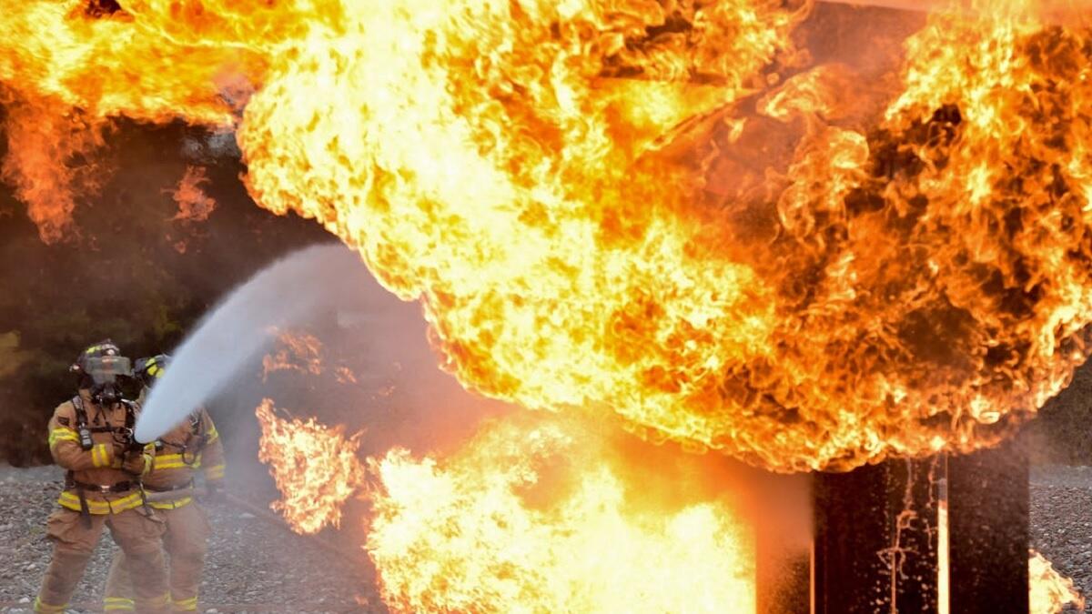 Fire fighters put out school flames