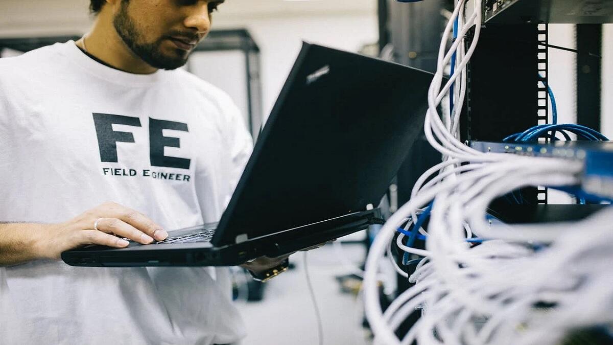 Engineers working on maintaining Unisa systems