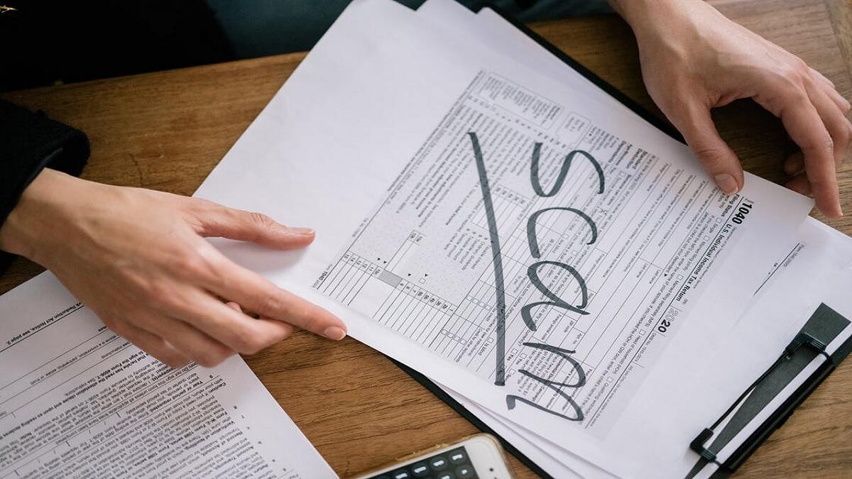 Young man mistakening a scam for a job offer