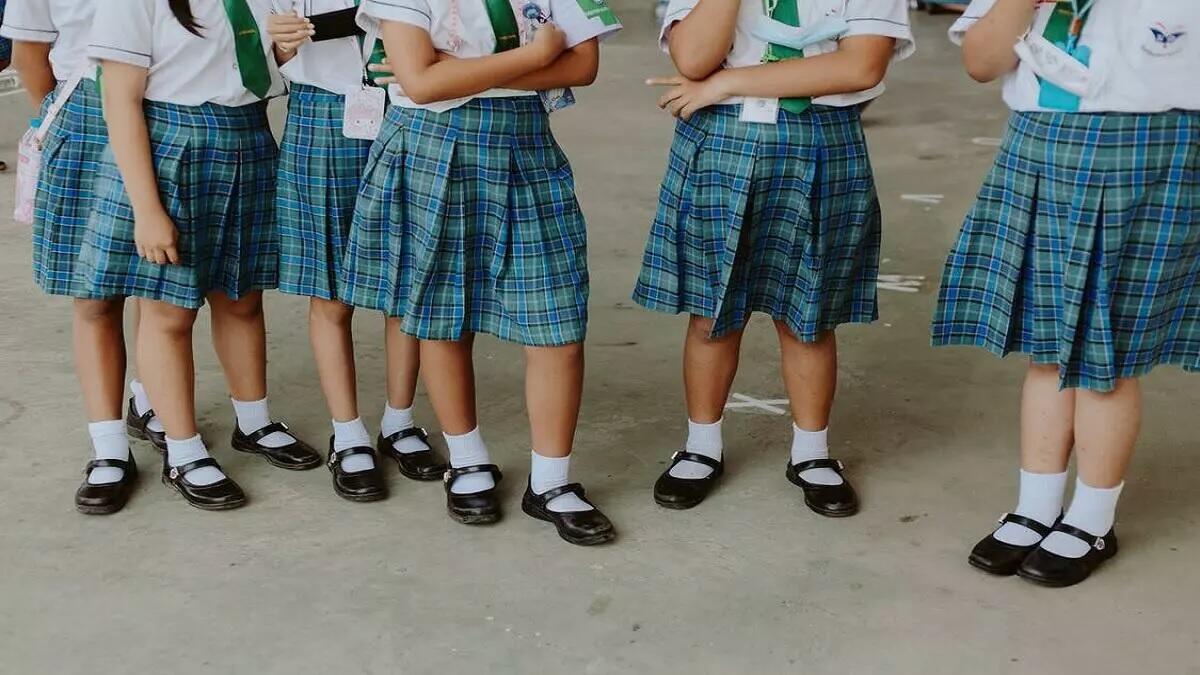 Learners wear school uniform