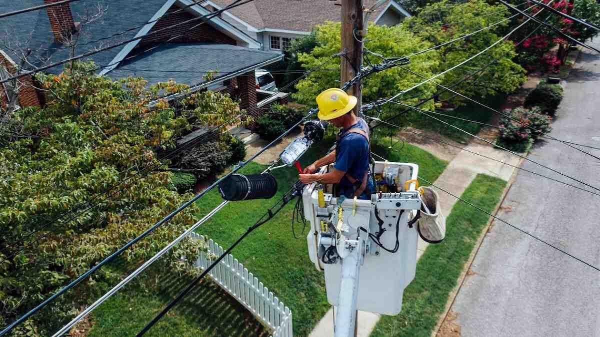 Person repairing electrical wires