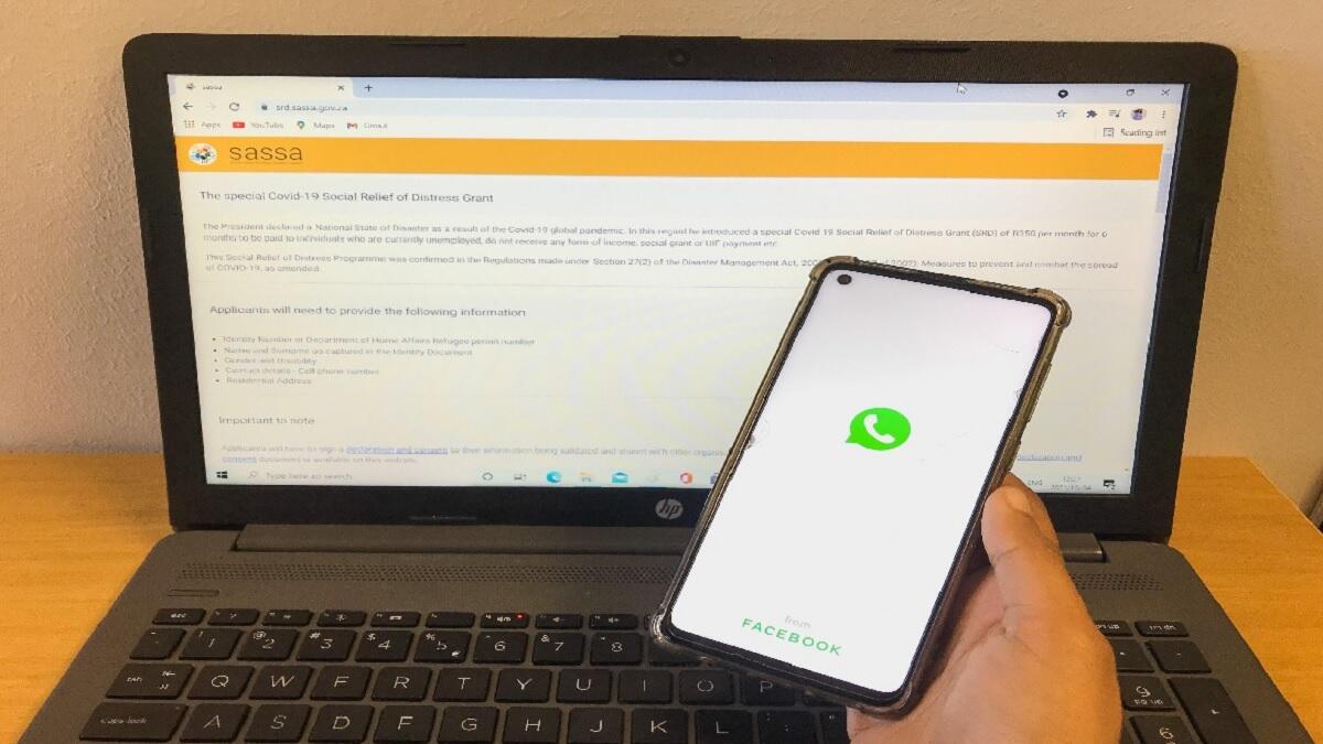 Client tracks its SRD grant status using a laptop