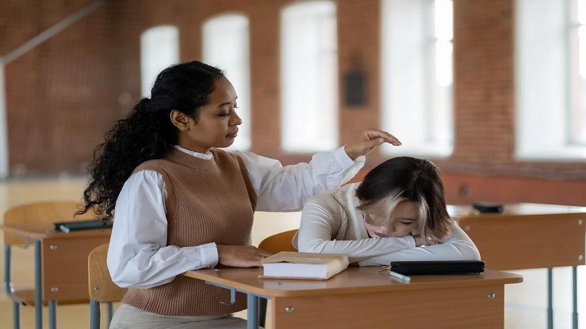 student comforts and supports depressed friend