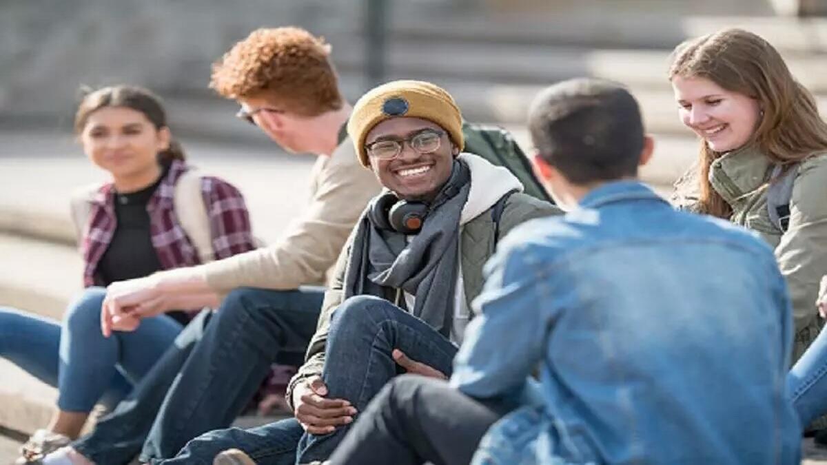 University students discussing employment in various fields