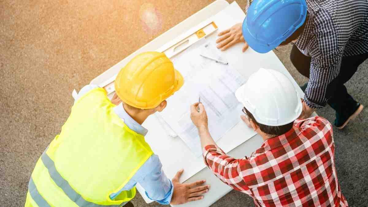 Engineers brainstorming around a table