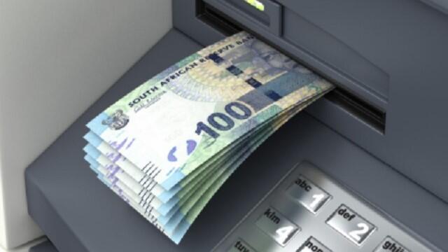 Sassa money being withdrawn from an ATM