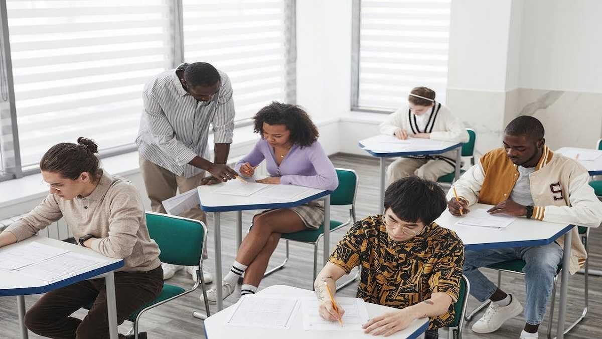 Learners Taking Exam Inside A Classroom