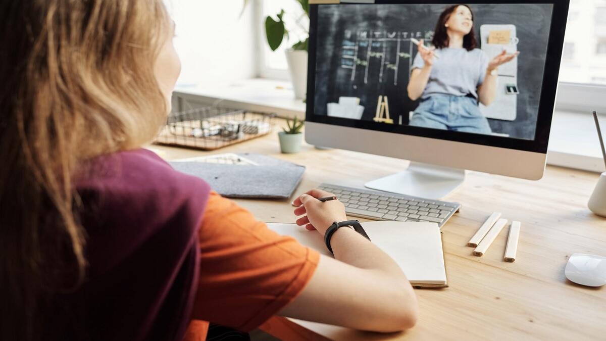Learner in front of laptop