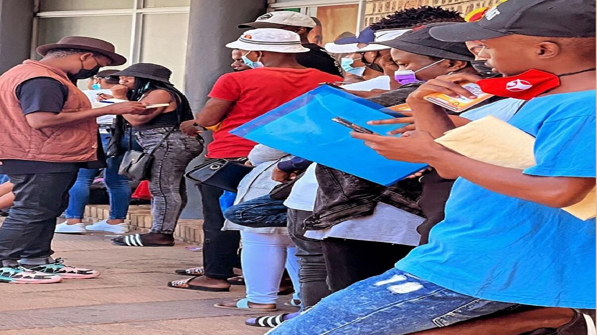 Students waiting in a queue