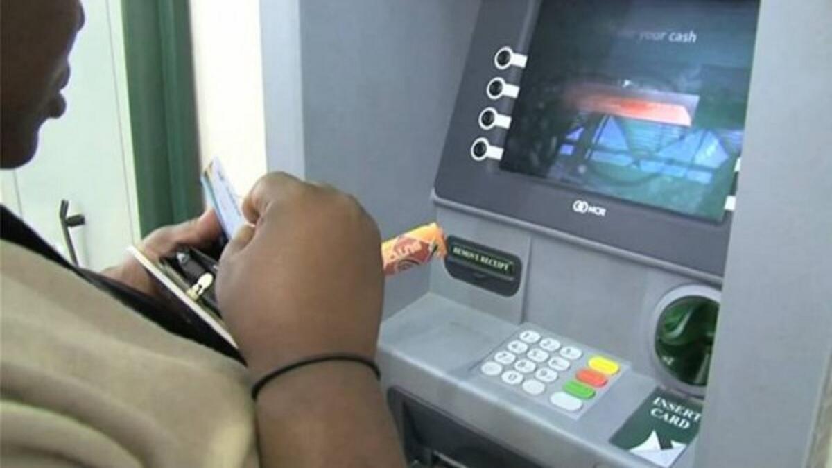 Person withdrawing cash