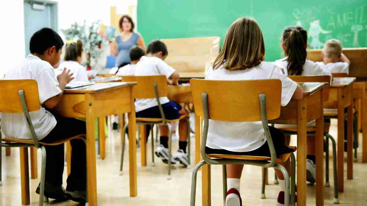 School children learning to read