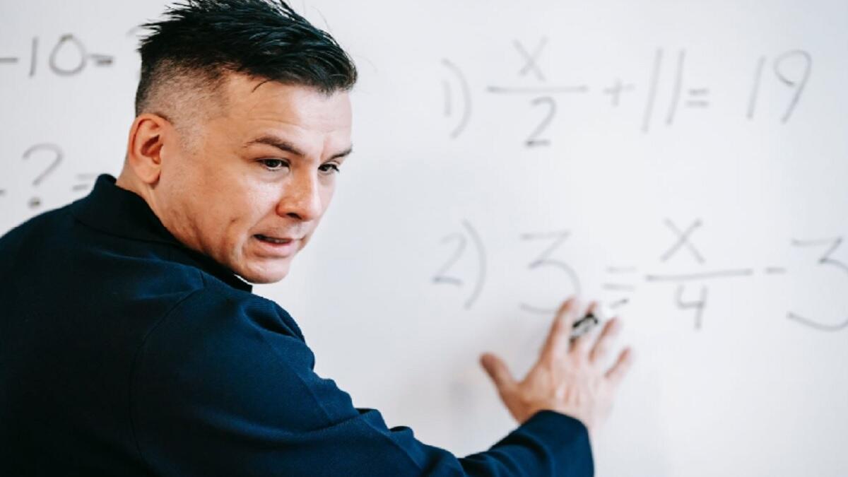 person teaching a bridging course