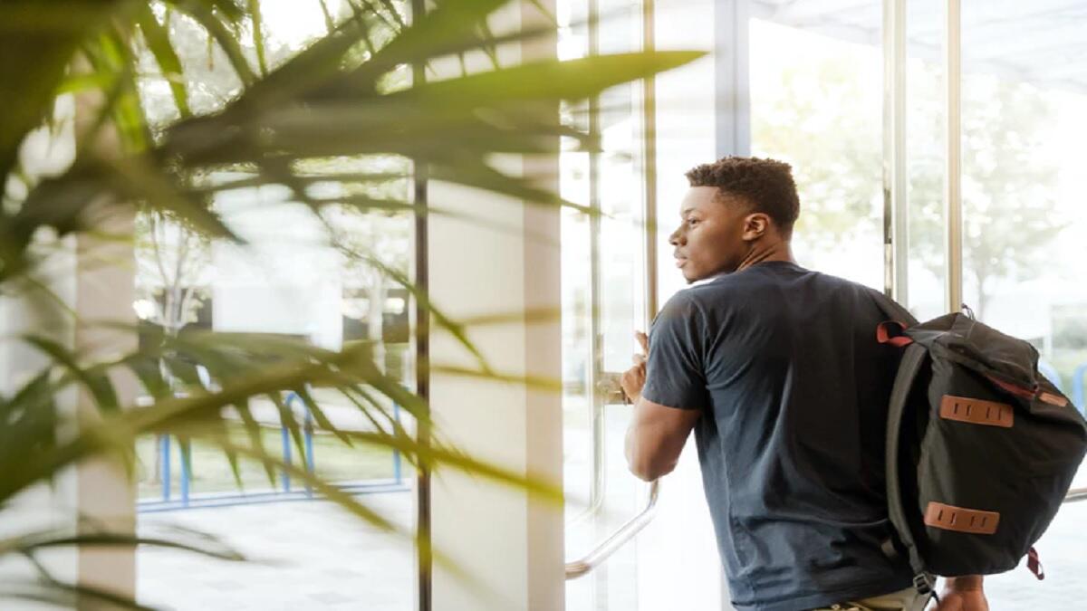 student exiting building