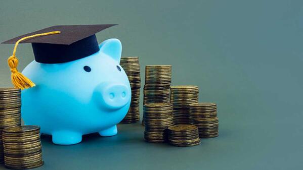Blue piggy bank coins mortar board