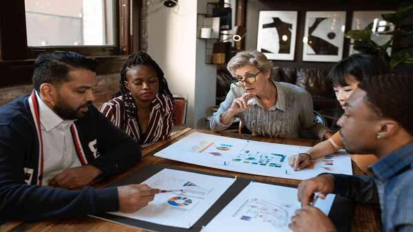 A group of entrepreneurs pitching ideas to each other
