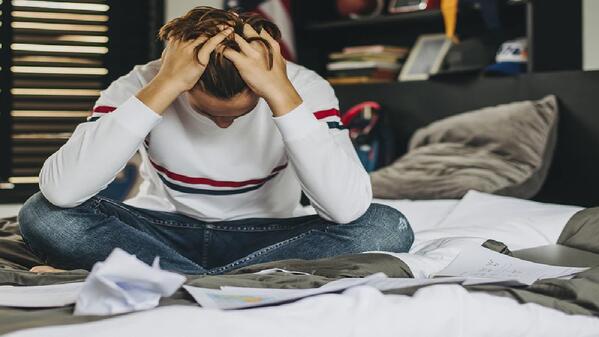 Student stressing over exam results 
