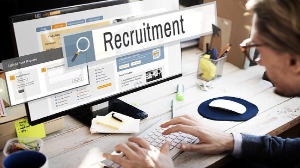 A person searching for employment online 