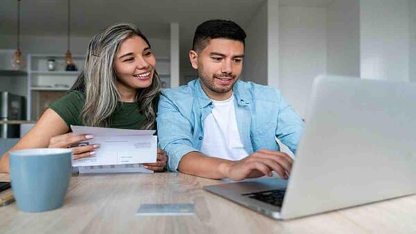 Students registering online for university.