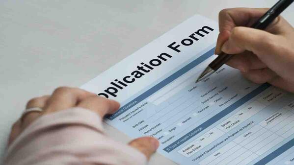 Applicant filling out a Rosebank College application form