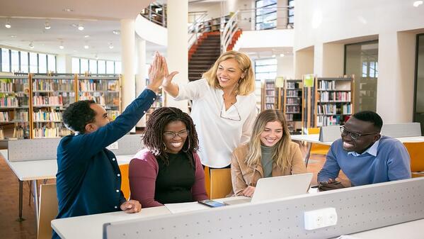 Lecturer congratulates students after FNB approves student loans