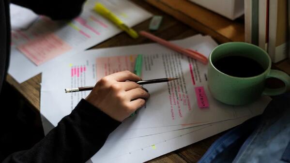 student doing a consumer studies past paper 