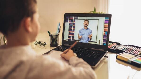 student having an online class on their laptop