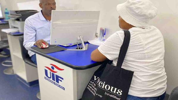 UIF official assisting applicant