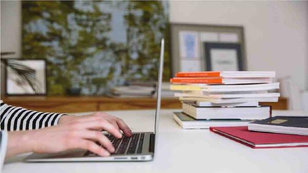 person studying a Post-Graduate Diploma in Business Administration
