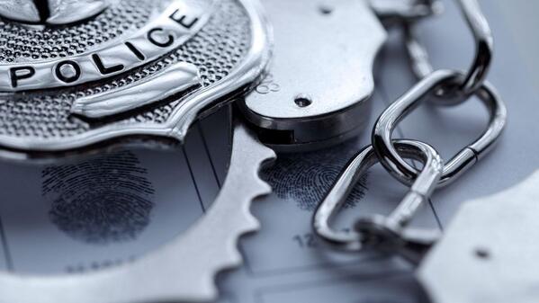 police badge and handcuffs
