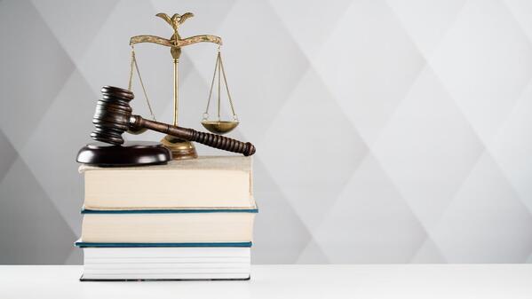 law books stacked on top of each other
