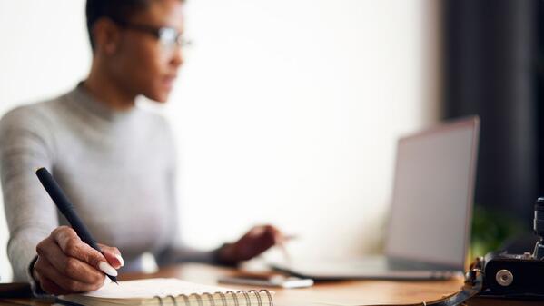 lady typing on her laptop